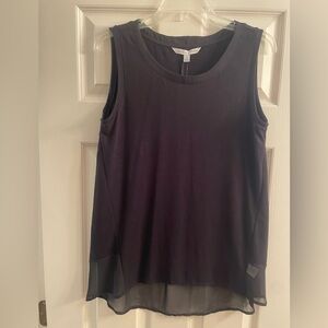 Black sleeveless hi-low top